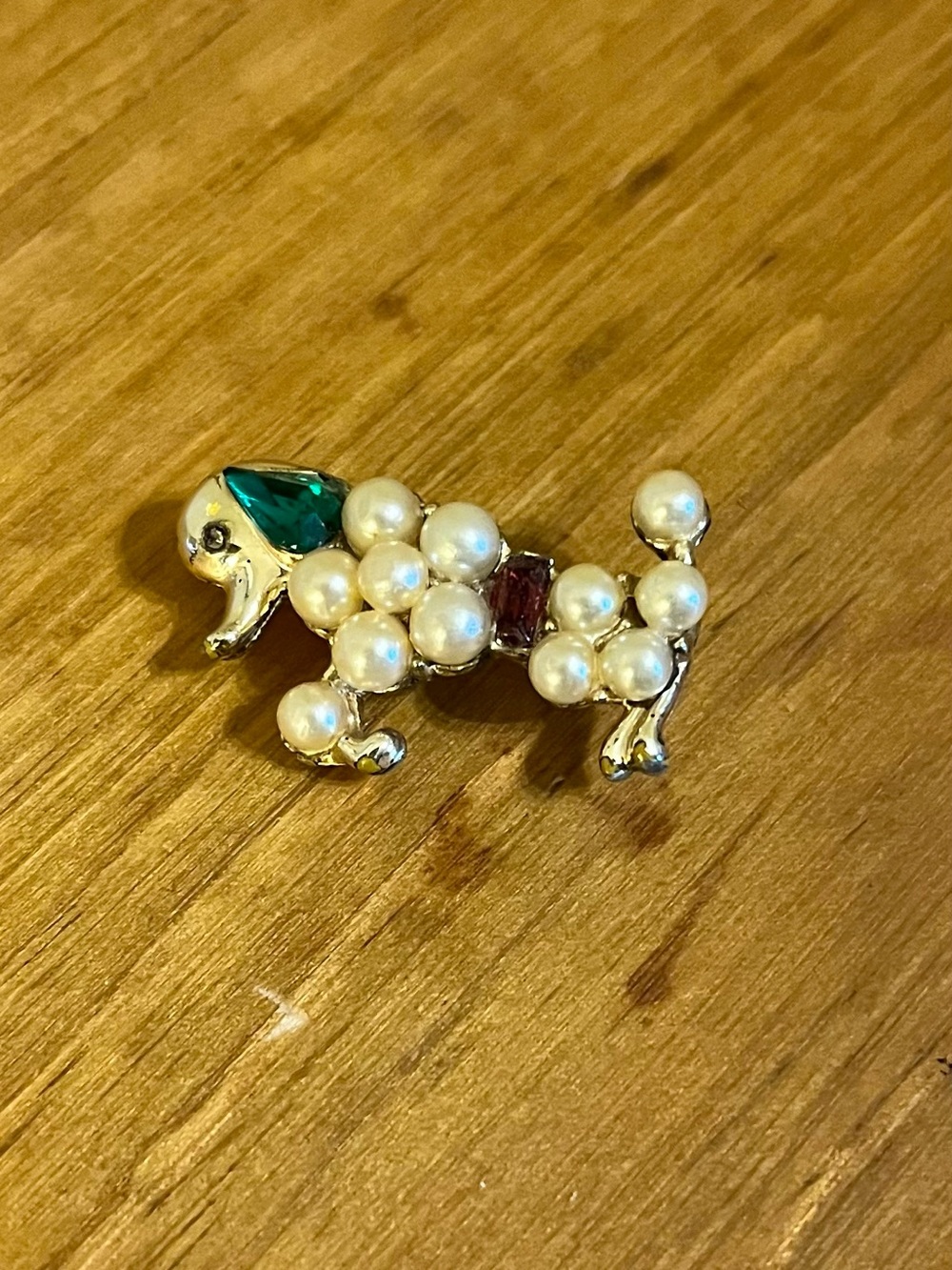 Vintage poodle brooch on gold tone with pearl like beads, green& red 1 1/2”